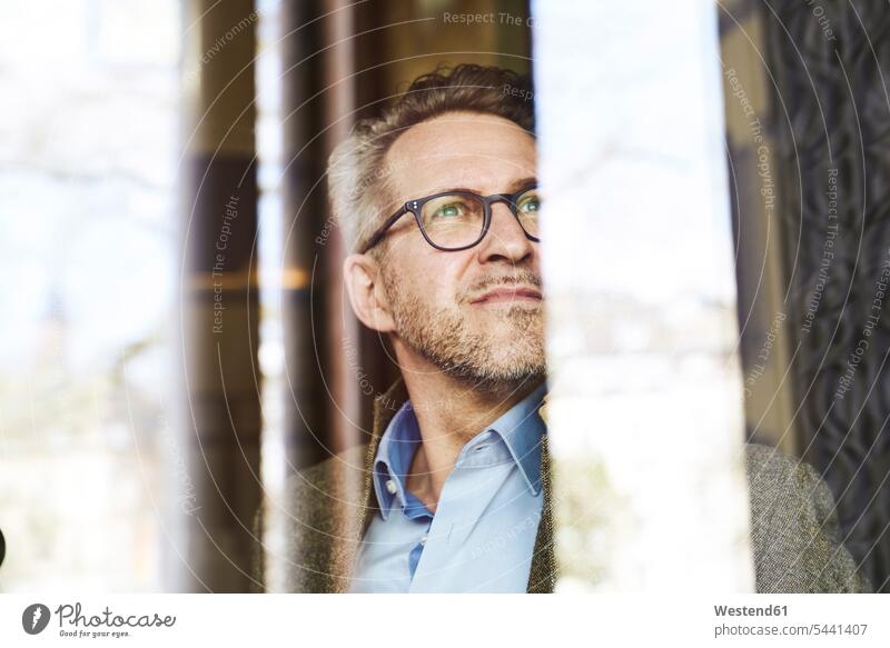 Portrait of businessman looking at distance men males Adults grown-ups grownups adult people persons human being humans human beings glasses specs Eye Glasses