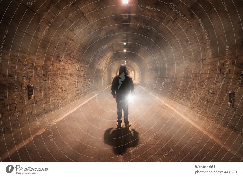 Spain, Huesca, young man exploring a dark tunnel mystery Inexplicable Unexplained mysterious Danger dangerous road streets roads fog foggy misty nameless