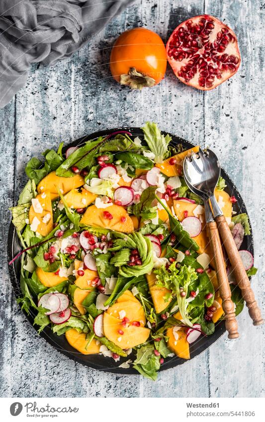 Kaki salad with red radish, pomegranate, avocado and cheese food and drink Nutrition Alimentation Food and Drinks tasty savoury yummy Mouth-watering appetising