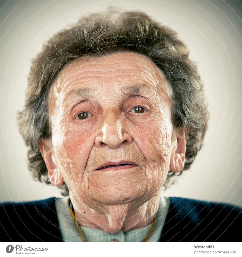 Portrait of an elderly lady Candid sad serious earnest Seriousness austere portrait portraits old senior women elder women elder woman senior woman Emotion