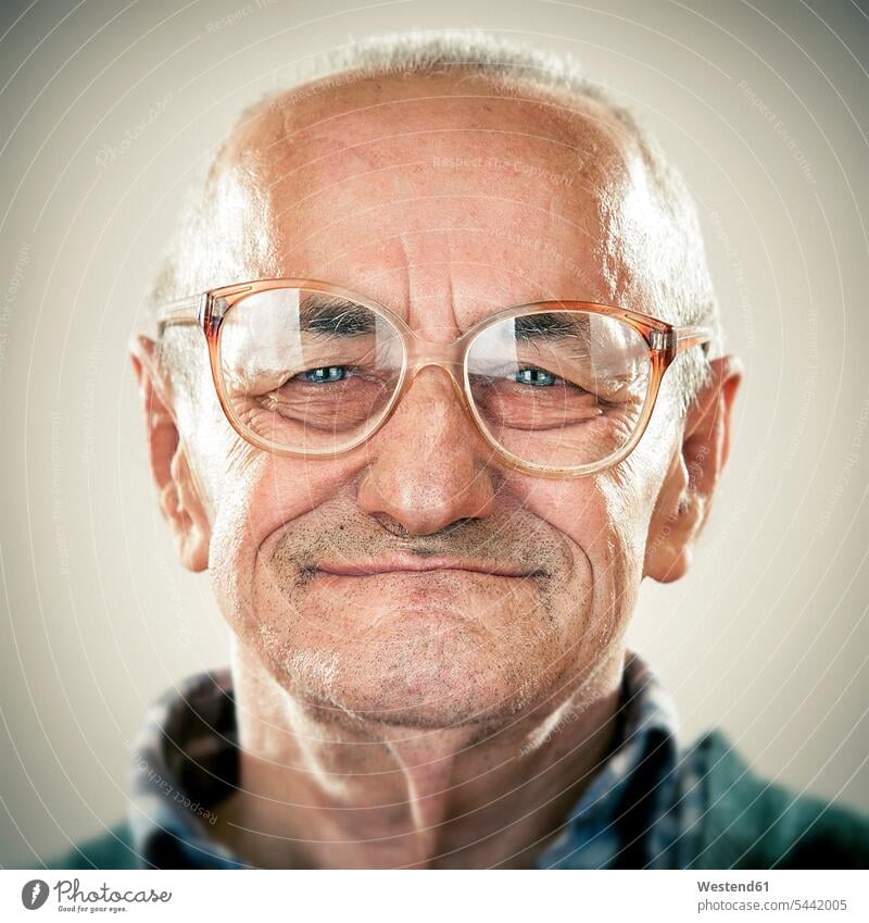 Portrait of an elderly man Candid glasses specs Eye Glasses spectacles Eyeglasses smiling smile portrait portraits old senior men senior man elder man elder men