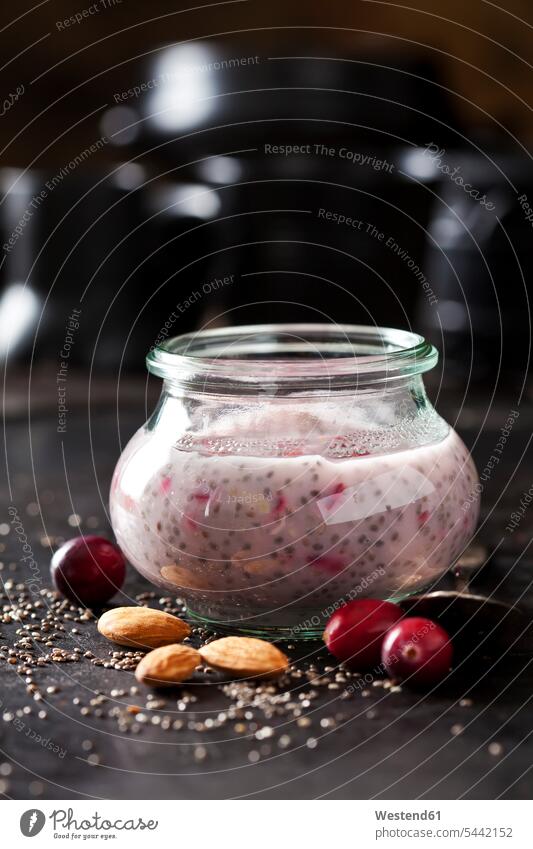Dessert of chia seeds, almonds and cranberries Glass Glasses rich in vitamines fruit garnished ready to eat ready-to-eat fruity Cranberry Cranberries Afters