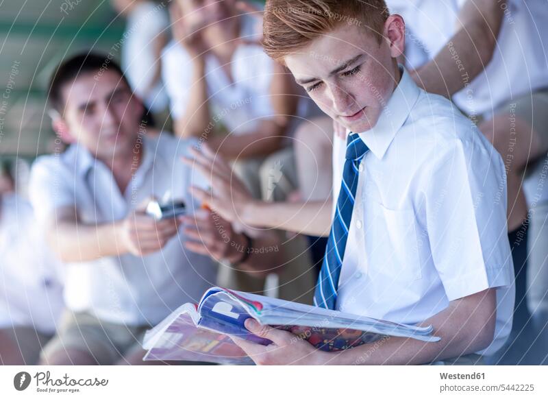 High school student denying to take a cigarette from classmate schools pupils cigarettes smoking smoke education tobacco product Tobacco Products South Africa