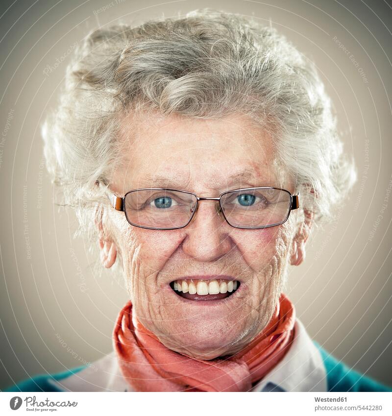 Portrait of an elderly lady cheerful gaiety Joyous glad Cheerfulness exhilaration merry gay smiling smile Candid glasses specs Eye Glasses spectacles Eyeglasses