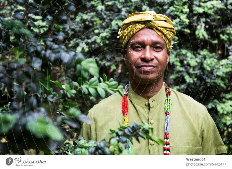 Portrait of smiling man wearing traditional Brazilian clothing portrait portraits men males Adults grown-ups grownups adult people persons human being humans