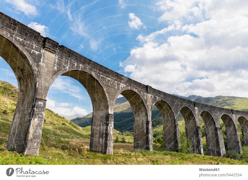 Great Britain, Scotland, Scottish Highlands, Glenfinnan, Glenfinnan Viaduct cloud clouds day daylight shot daylight shots day shots daytime railway bridge