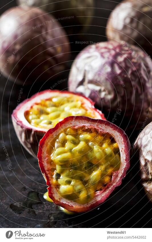 Passion fruit, close up overhead view from above top view Overhead Overhead Shot View From Above sliced juicy focus on foreground Focus In The Foreground