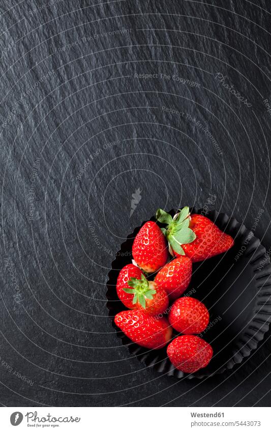 Baking dish of strawberries on slate food and drink Nutrition Alimentation Food and Drinks red Berry berry fruits Berries Fruit Fruits Strawberry Strawberries