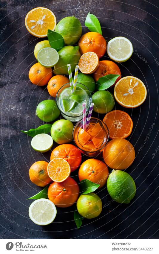 Limes, lemons, oranges and tangerines om dark background overhead view from above top view Overhead Overhead Shot View From Above Tangerine Citrus reticulata