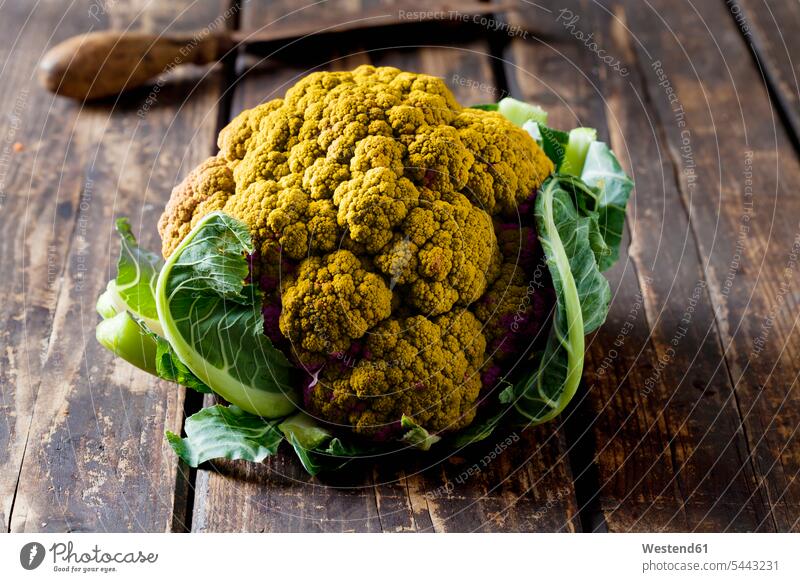 Yellow cauliflower on dark wood food and drink Nutrition Alimentation Food and Drinks Shabby chic focus on foreground Focus In The Foreground