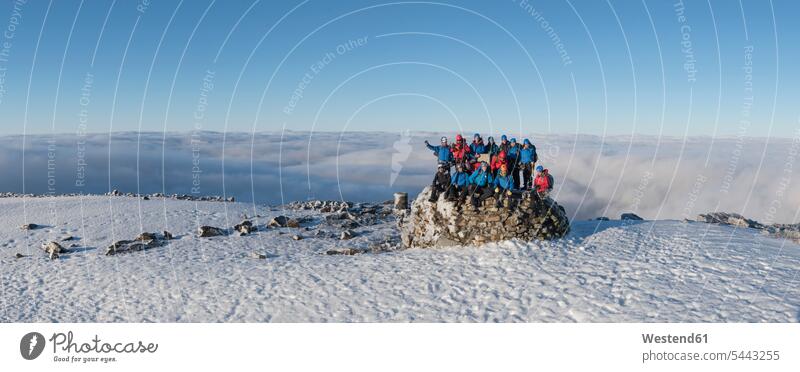 UK, Scotland, Ben Nevis, mountaineers on summit group of people Group groups of people winter hibernal climber alpinists climbers Mountain Climber