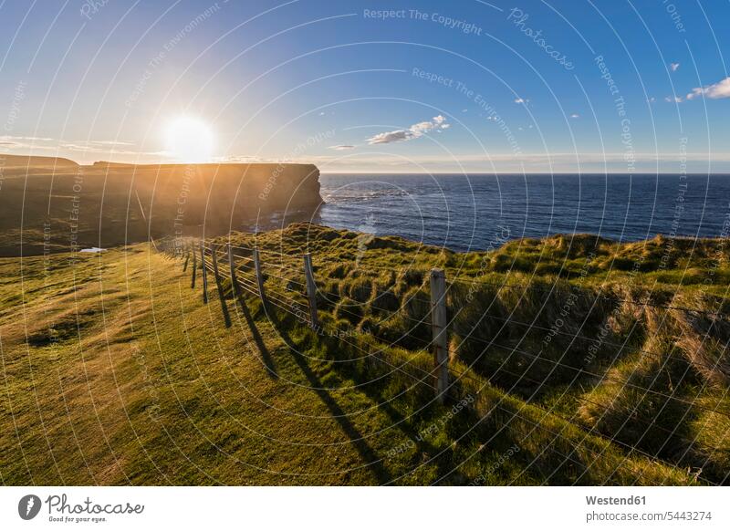 UK, Scotland, Caithness, Coast of Duncansby Head at sunset coast coastline coast area Seacoast seaside sunsets sundown Backlit back light backlight