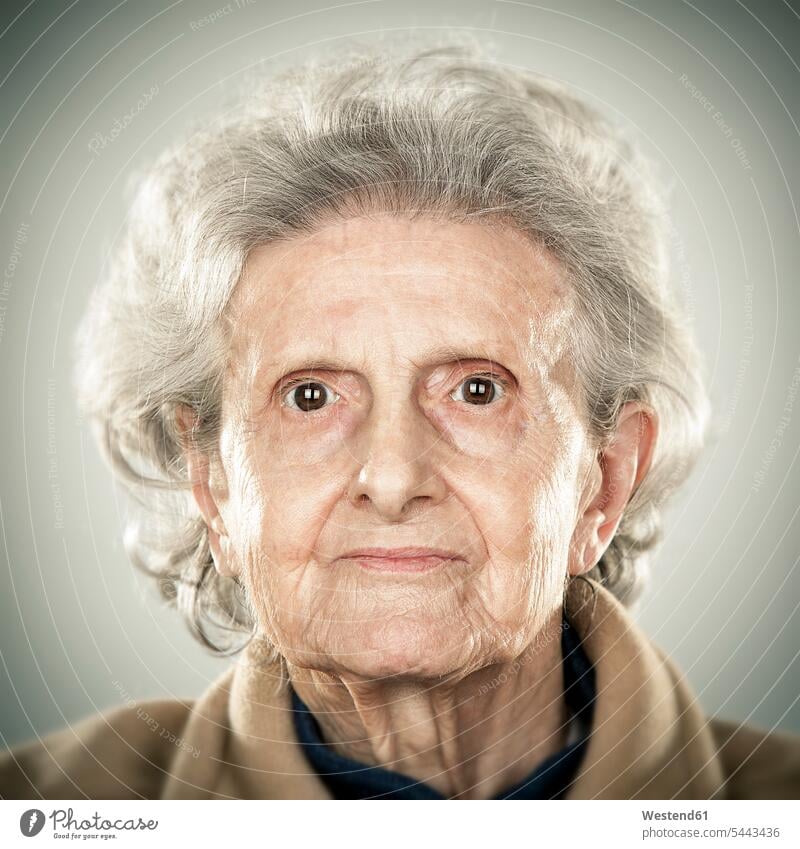 Portrait of an elderly lady serious earnest Seriousness austere Candid portrait portraits old senior women elder women elder woman senior woman senior adults