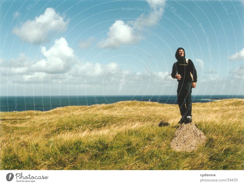 Free Period II Man Posture Clouds Meadow Ocean Emotions Release Impression Summer Human being Freedom Landscape Sky Stone North Sea Helgoland Wind