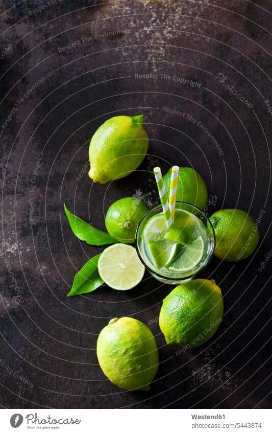Organic green limes on dark background overhead view from above top view Overhead Overhead Shot View From Above copy space elevated view High Angle View