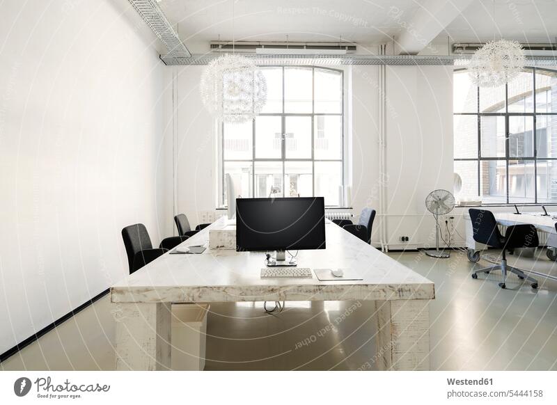 Interior of a modern agency office desk desks furnishing Furnishings occupation profession professional occupation jobs style stylish agencies business