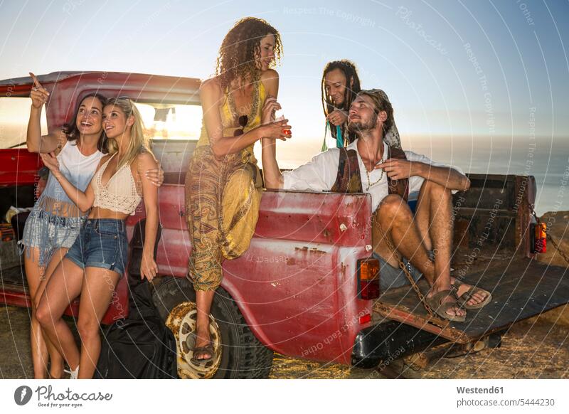 Happy young people outside pick up truck at the coast coastline shoreline friends Fun having fun funny friendship Simple Living Downshifting simple life Pick Up