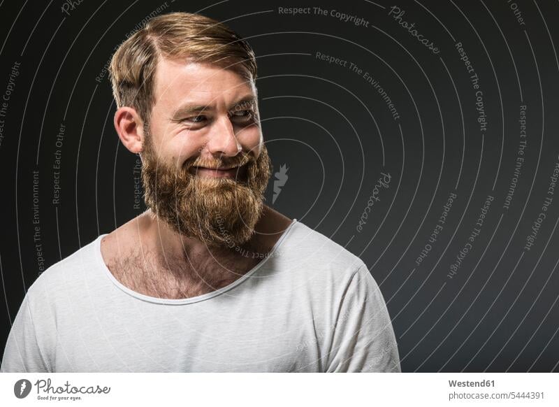 Portrait of smiling man with full beard portrait portraits men males smile Adults grown-ups grownups adult people persons human being humans human beings