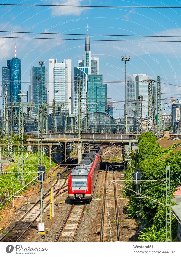 Germany, Frankfurt, view to central station with financial district in the background motion Movement moving Mobility mobile train station building buildings