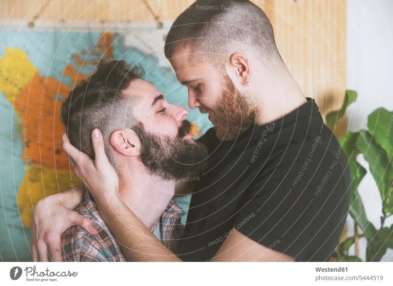 Young gay couple in love face to face twosomes partnership couples gay men gay man homosexual men homosexual man looking eyeing people persons human being