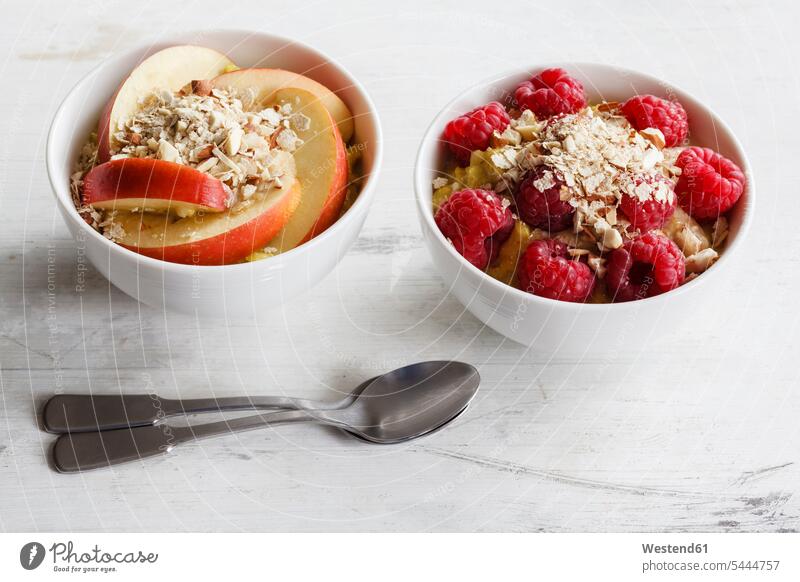 Bowl of porridge with raspberries and bowl of porridge with apples food and drink Nutrition Alimentation Food and Drinks ready to eat ready-to-eat divers