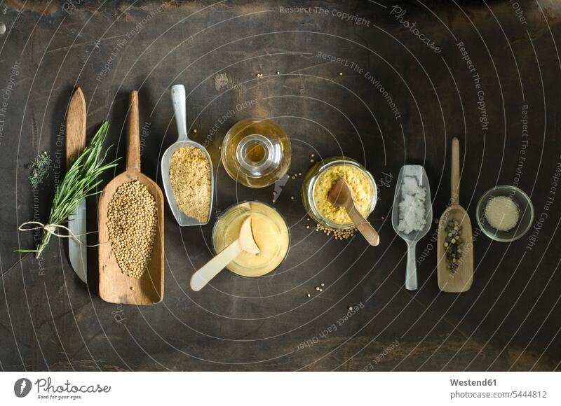 Ingredients for freshly made mustard Glass Glasses mustard grains homemade home made home-made vinegar scoop scoops overhead view directly above top view spoon