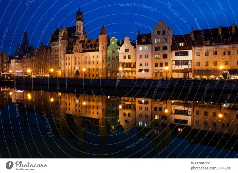 Poland, Gdansk, skyline at Motlawa bank with river reflection Incidental people People In The Background background person People In Background