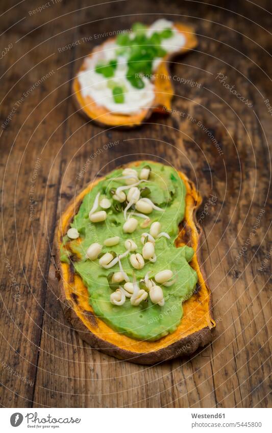 Toasted sweet potato slice garnished with avocado cream and sprouts nobody sliced ready to eat ready-to-eat spring onion spring onions green onion batata