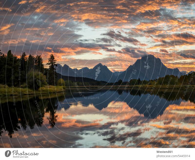 USA, Wyoming, Grand Teton National Park, sunset at Oxbow Bend evening light outdoors outdoor shots location shot location shots sunsets sundown water reflection