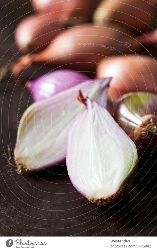 Sliced shallot white dark background whole Brown Background brown sliced half halves halved copy space focus on foreground Focus In The Foreground