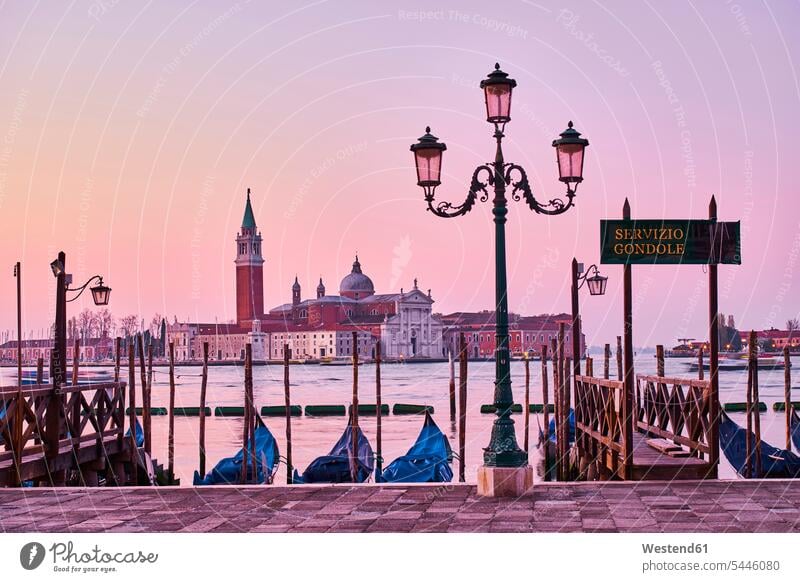 Italy, Venice, View of Giudecca from St Mark's Square with gondolas landmark sight place of interest historic historical ancient copy space morning