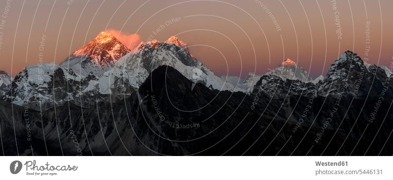 Nepal, Himalaya, Khumbu, Everest region, sunset on Everest and Nuptse Panorama outdoors outdoor shots location shot location shots Moody Sky impressive
