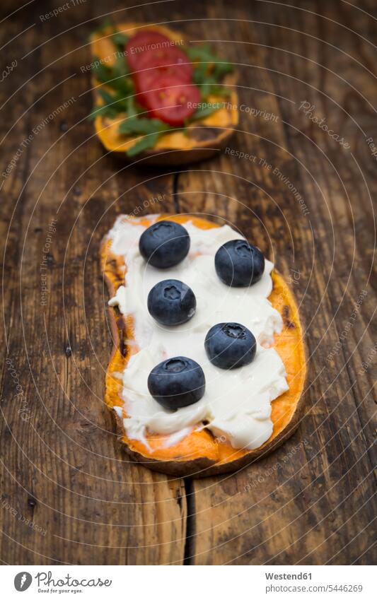 Toasted sweet potato slice garnished with cream cheese and blueberries nobody Slice Slices sliced ready to eat ready-to-eat blueberry bilberry bilberries batata