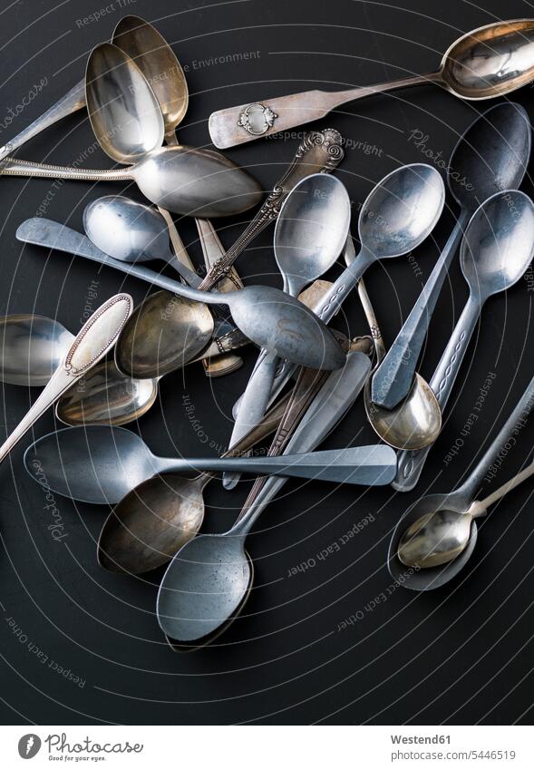 Heap of various silver and golden spoons silver cutlery silvery Gold Color Gold Colored silver spoon messy clutter Untidy Untidiness Slovenly Cluttered Disorder