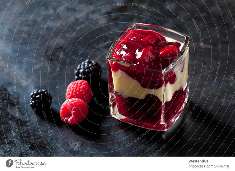 red fruit compote with vanilla sauce layered in a glass copy space Cherry Cherries Layers Berry berry fruits Berries ready to eat ready-to-eat studio shot
