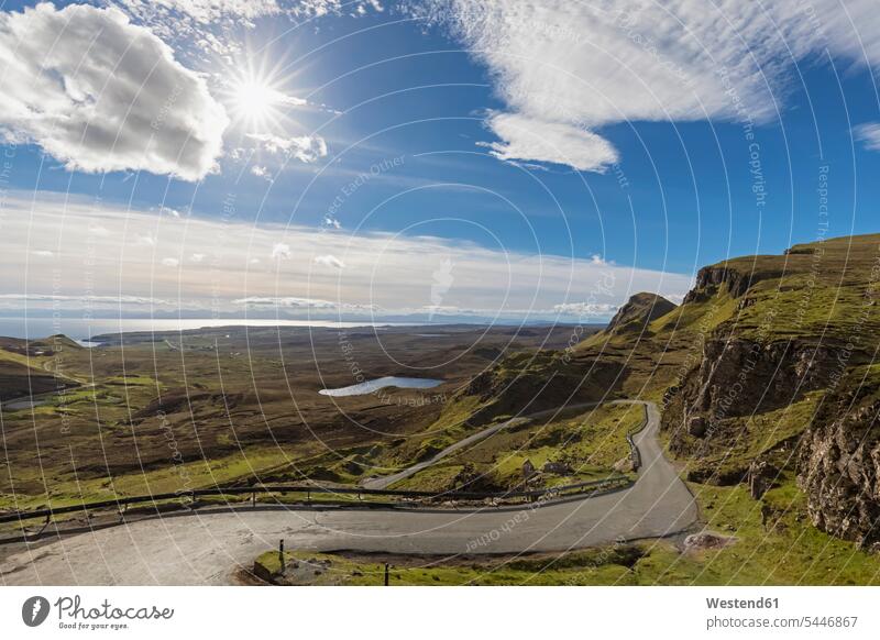 UK, Scotland, Inner Hebrides, Isle of Skye, Trotternish, Loch Cleat, road towards Quiraing, view towards Staffin Bay lake lakes impressive monumental Highland