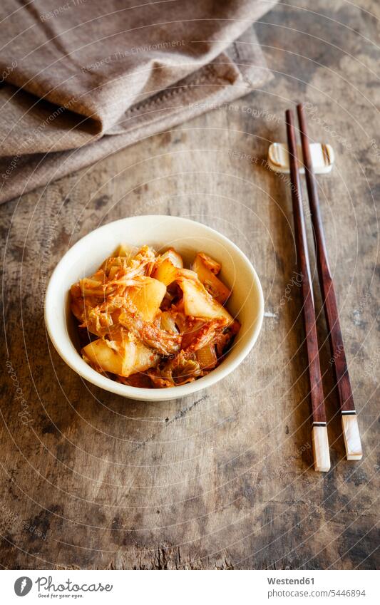 Fresh house made kimchi with chopsticks asian food ready to eat ready-to-eat delicacy specialty specialties Kimchi kimchee pickled pickles Chinese Cabbage
