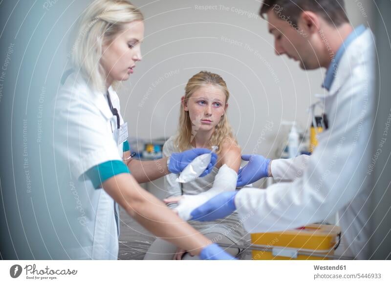 Injured girl getting treatment in hospital accident injury Physical Injury injuries patient doctor physicians doctors cast Medical Clinic Female Doctor