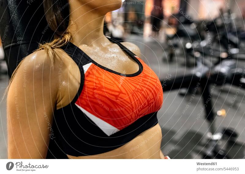 Close-up of woman sweating in gym gyms Health Club exercising exercise training practising perspiration females women fitness sport sports Adults grown-ups