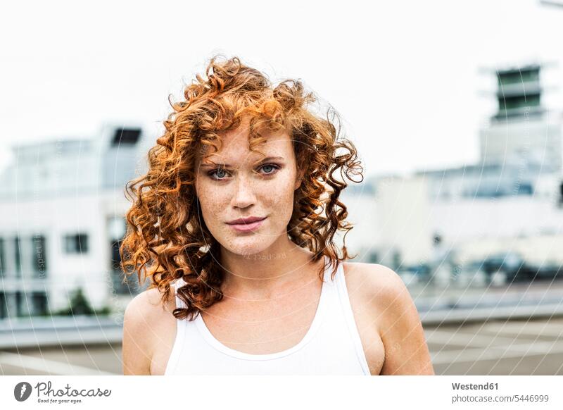 Portrait of redheaded woman outdoors curly hair curls portrait portraits females women hairstyle hair-dos hairstyles hairdos people persons human being humans