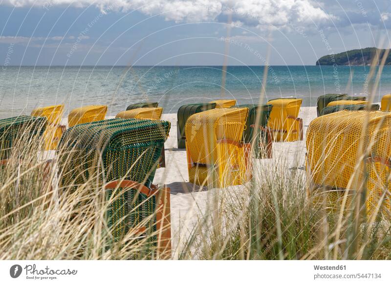 Germany, Mecklenburg-Western Pomerania, Baltic sea seaside resort Binz, Hooded beach chairs on the beach hooded beach chair roofed wicker beach chair