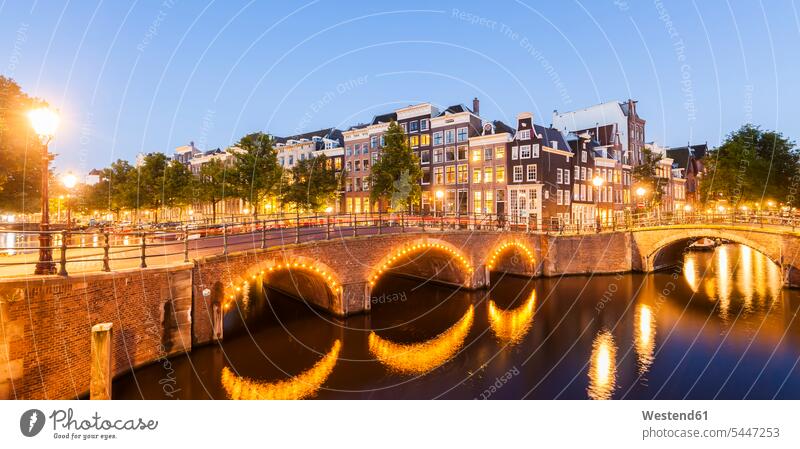 Netherlands, Amsterdam, lighted bridges over Emperor's Canal and Leidse Canal in the evening typical typically historical Street Light street lamp street lights