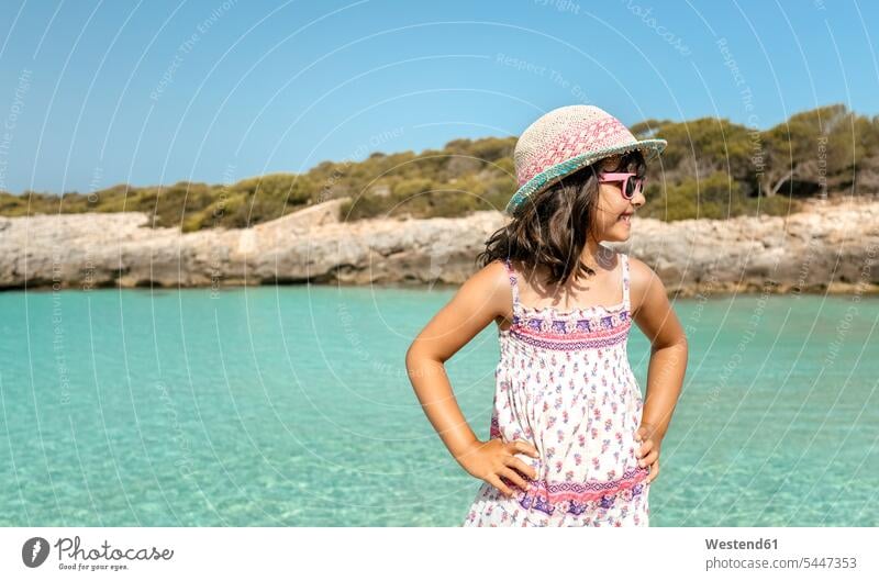 Girl standing at the beach girl females girls sea ocean vacation holidays vacations happiness happy summer summer time summery summertime beaches child children