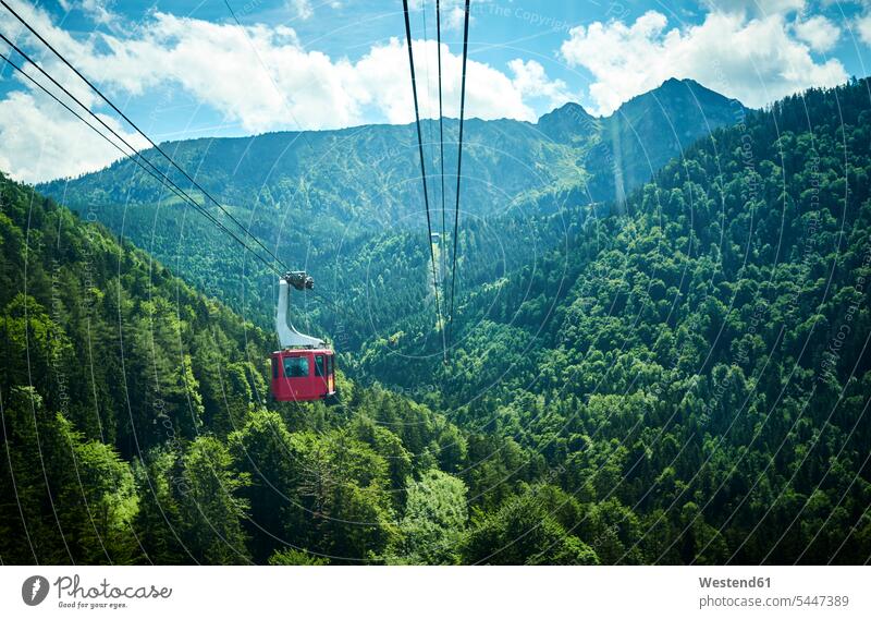 Germany, Chiemgau, gondola of Hochfelln Cable Car outdoors outdoor shots location shot location shots forested tree-covered wooded Incidental people