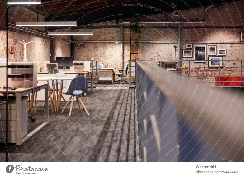 Interior of a modern industrial style loft office occupation profession professional occupation jobs copy space Absence Absent Railing Railings furnishing