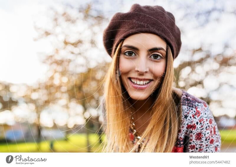 Portrait of smiling young woman wearing beret in autumn portrait portraits females women fall Adults grown-ups grownups adult people persons human being humans