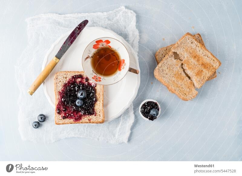 Toast with blueberry jam and cup of tea food and drink Nutrition Alimentation Food and Drinks bilberry blueberries bilberries toast bread Toasts copy space Tea