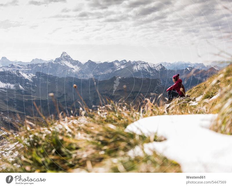Germany, Bavaria, Oberstdorf, hiker sitting in alpine scenery mountain range mountains mountain ranges woman females women Seated hiking landscape landscapes