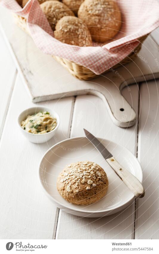 Homemade oat rolls with compound butter Plate dish dishes Plates Chopping Board Cutting Boards Chopping Boards wooden Bread basket bread baskets homemade