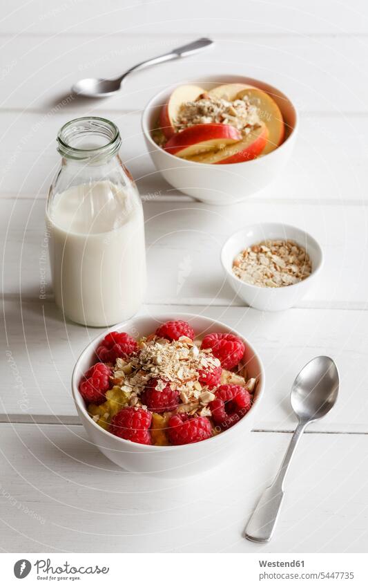 Bowl of porridge with raspberries and bowl of porridge with apples food and drink Nutrition Alimentation Food and Drinks Oat Flakes rolled oats healthy eating